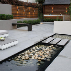 Rahato stones surrounding a fire pit adding stable edging and heat-resistant decoration