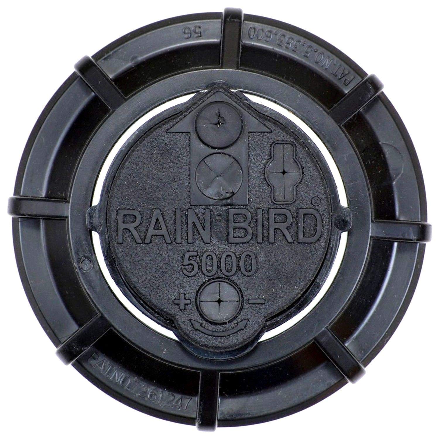 Rain Bird 4-inch pop-up height beside a ruler showing proper clearance for mowing