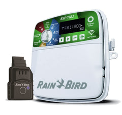 Rain Bird ESP-TM2 mounted at home landscape demonstrating remote-managed watering