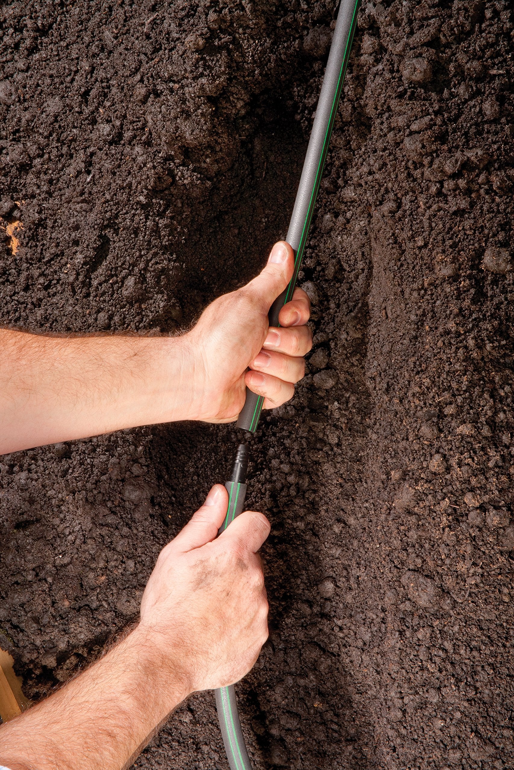 Rain Bird EZ Pipe installed with a pop-up sprinkler showing flexible routing