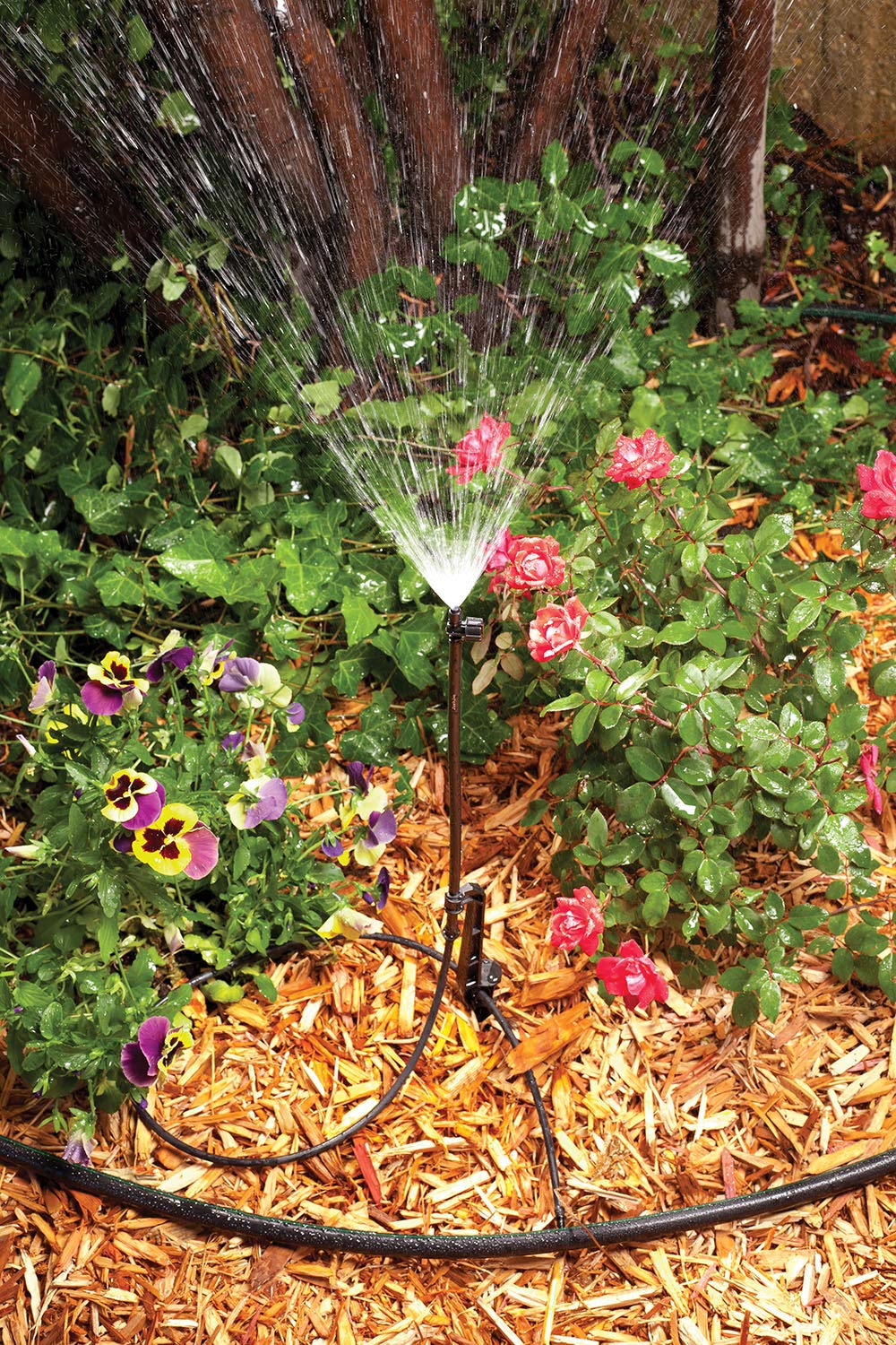 Rain Bird kit installed in raised bed illustrating tidy hidden tubing