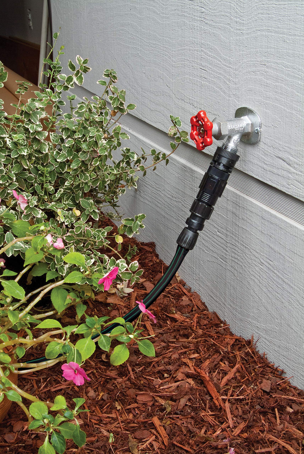 Rain Bird rolls of 1/2 inch and 1/4 inch tubing demonstrating flexibility
