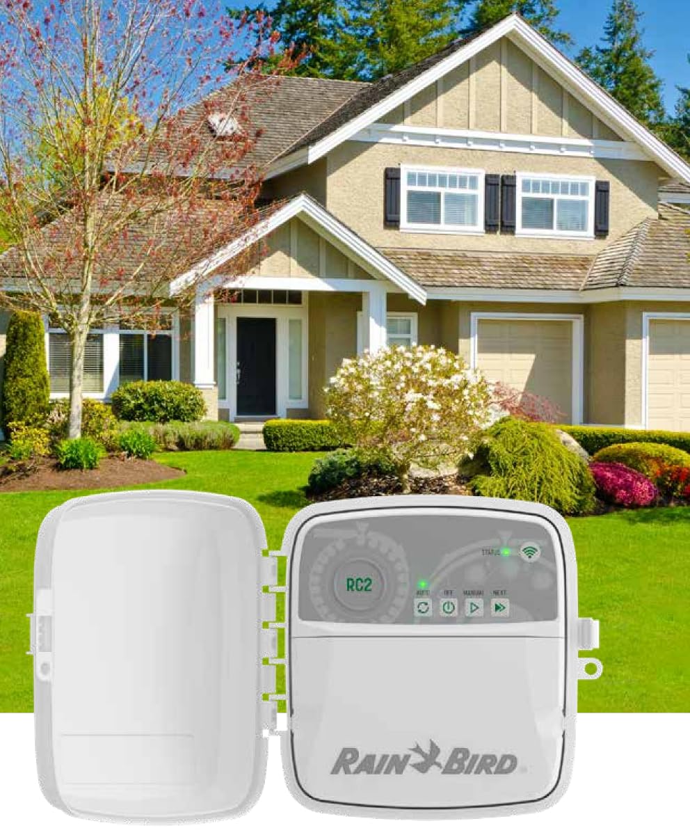 Rain Bird RC2 held in hand for scale showing compact contractor-friendly size