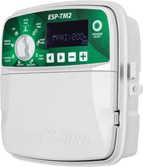 Rain Bird TM2-6 front panel showing intuitive dial and buttons for quick setup and control