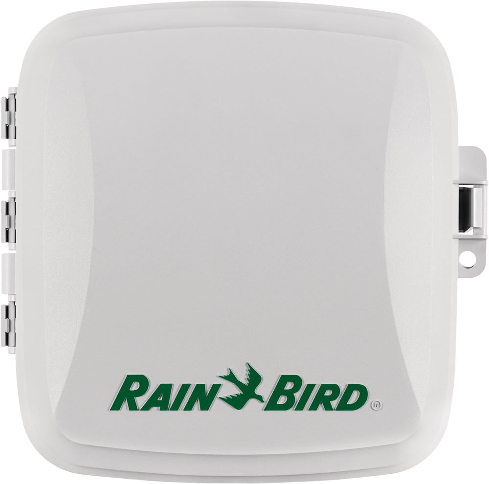 Rain Bird TM2-6 installed outdoors beside garden showing durable weather-resistant housing advantage