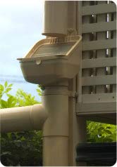 Rain Harvesting Leaf Eater next to hands illustrating scale and easy handling