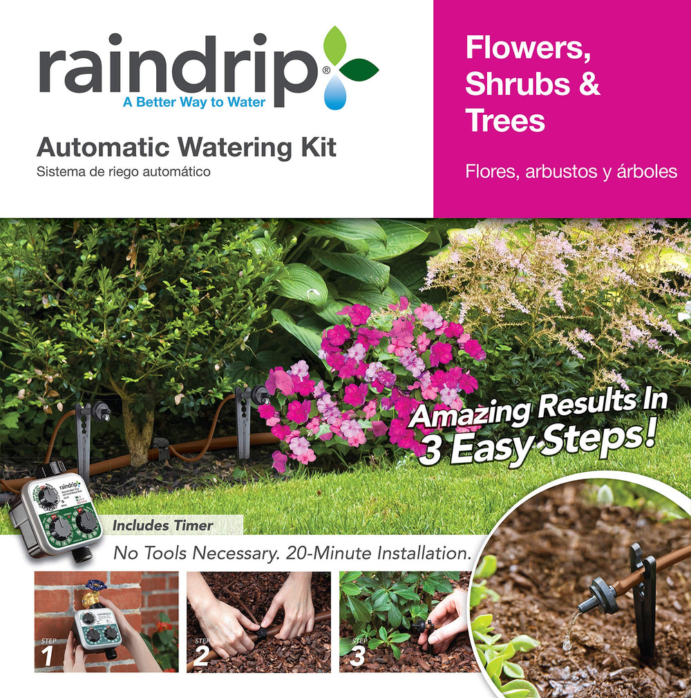 Raindrip 2 GPH dripper positioned at plant root for precise watering