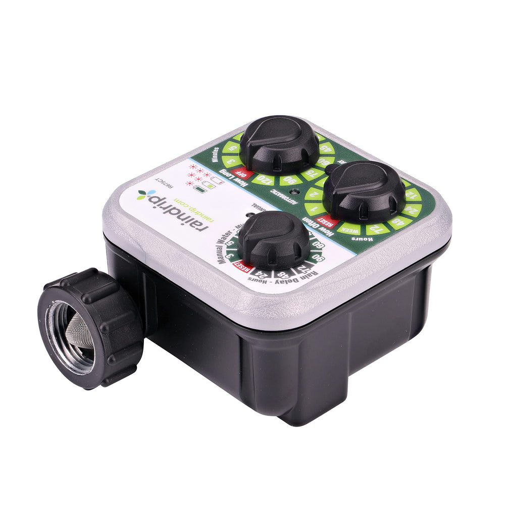 Raindrip timer installed in garden illustrating automated watering convenience