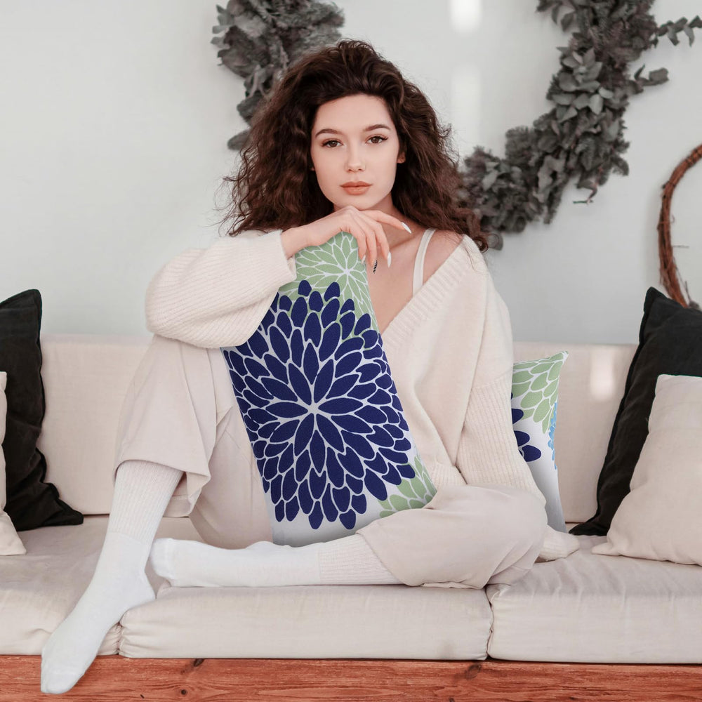 rasugarlary two pillows on wicker chaise displaying coordinated styling benefit