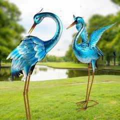 Ratuor winged heron flight-pose showing dynamic garden focal benefit