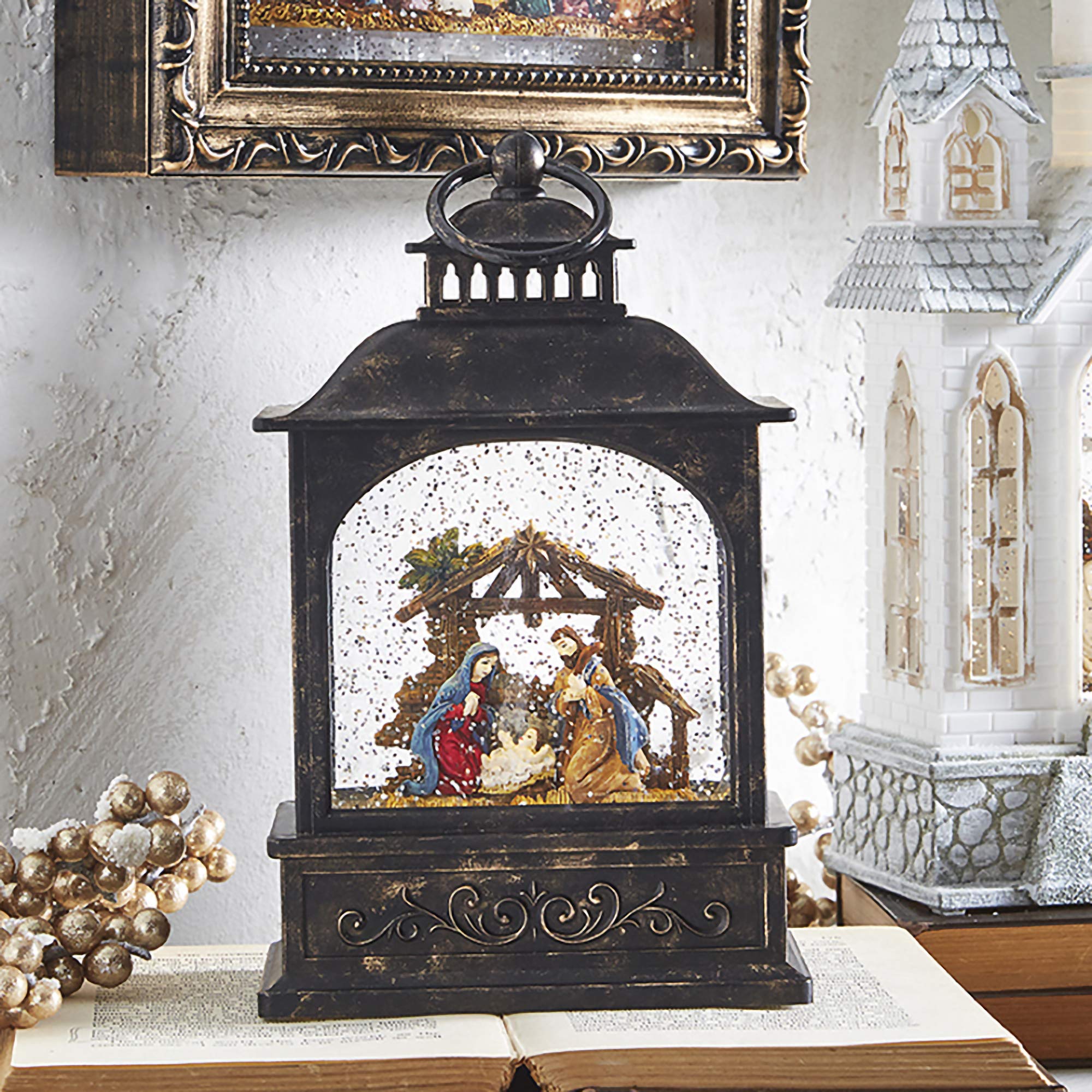 RAZ Imports close-up of lit Holy Family scene highlighting detail and serene ambiance