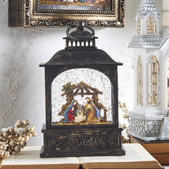 RAZ Imports close-up of lit Holy Family scene highlighting detail and serene ambiance