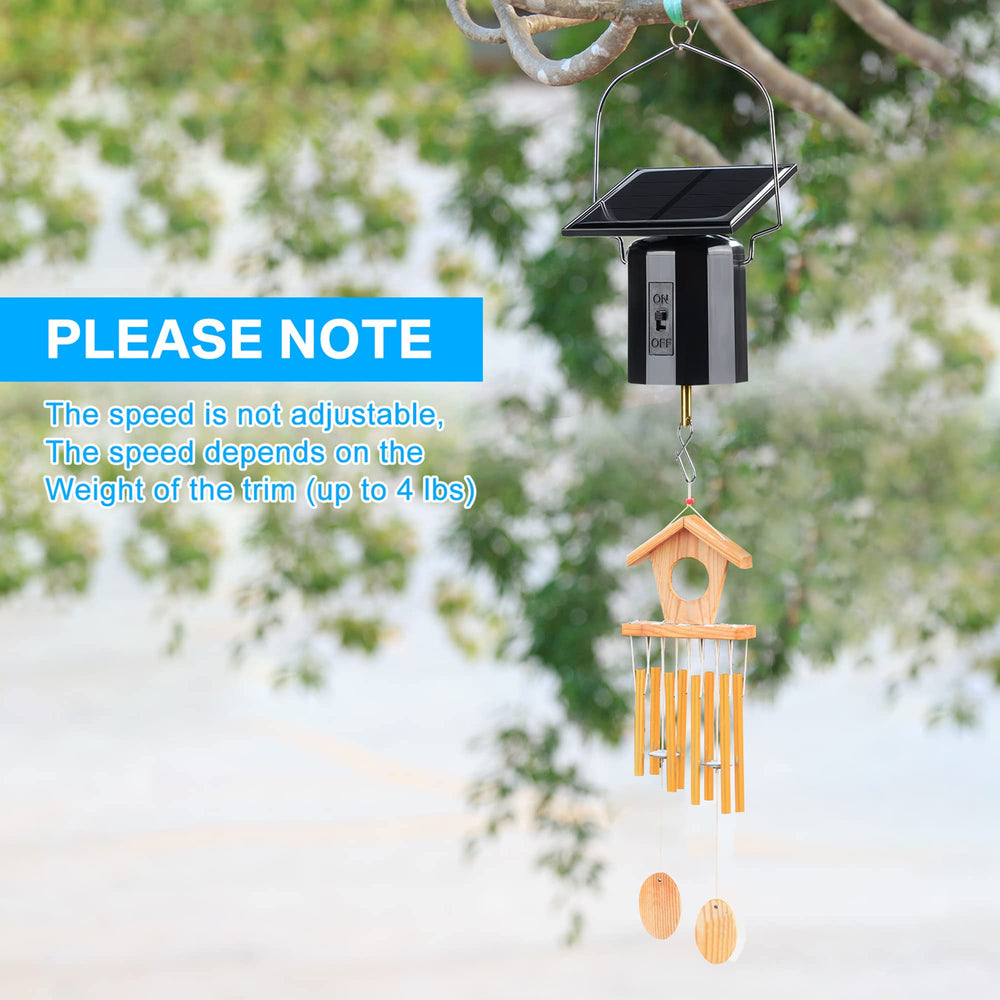 Reginary motor hanging with wind chime in garden demonstrating steady rotation benefit