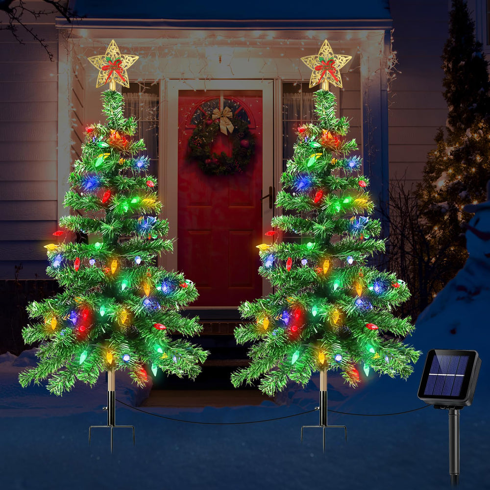 ReyeeInc front view of two solar Christmas tree stakes showing full shape and lights benefit low-maintenance decor