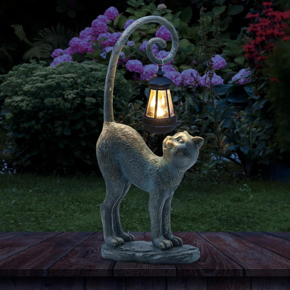 REYISO front view of cat statue showing bronze finish and lamp