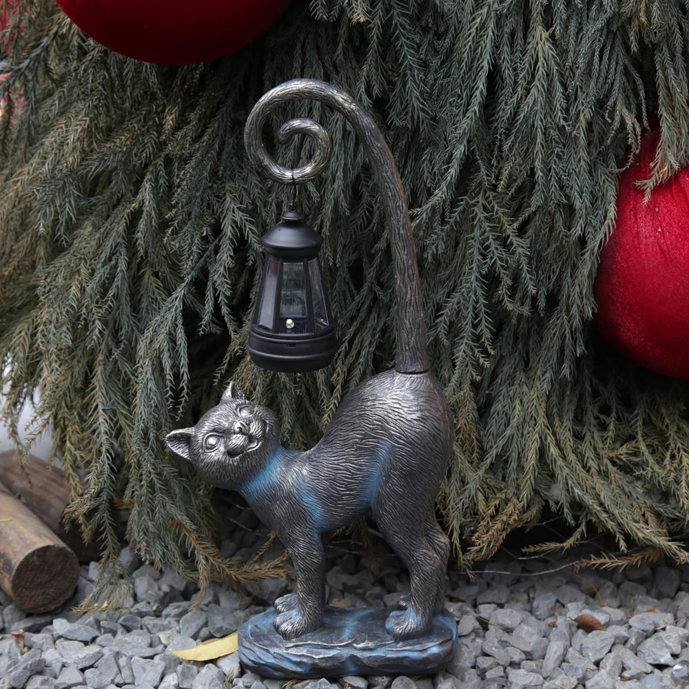 REYISO cat statue placed on porch adding welcoming decor
