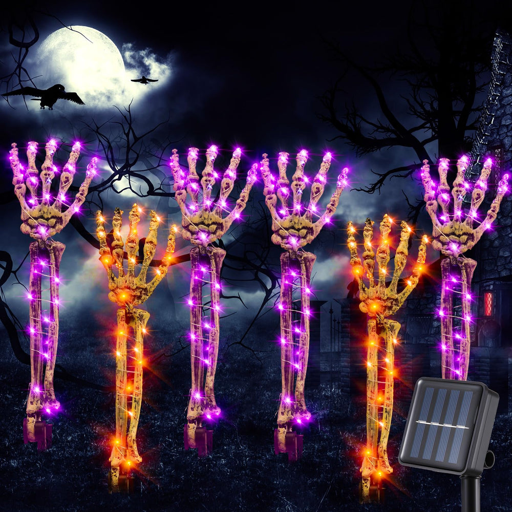 Riakrum front view of six skeleton arm stakes creating spooky curb appeal