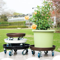 RIAMTGCX dolly with large ceramic planter in use demonstrating easy relocation and stability