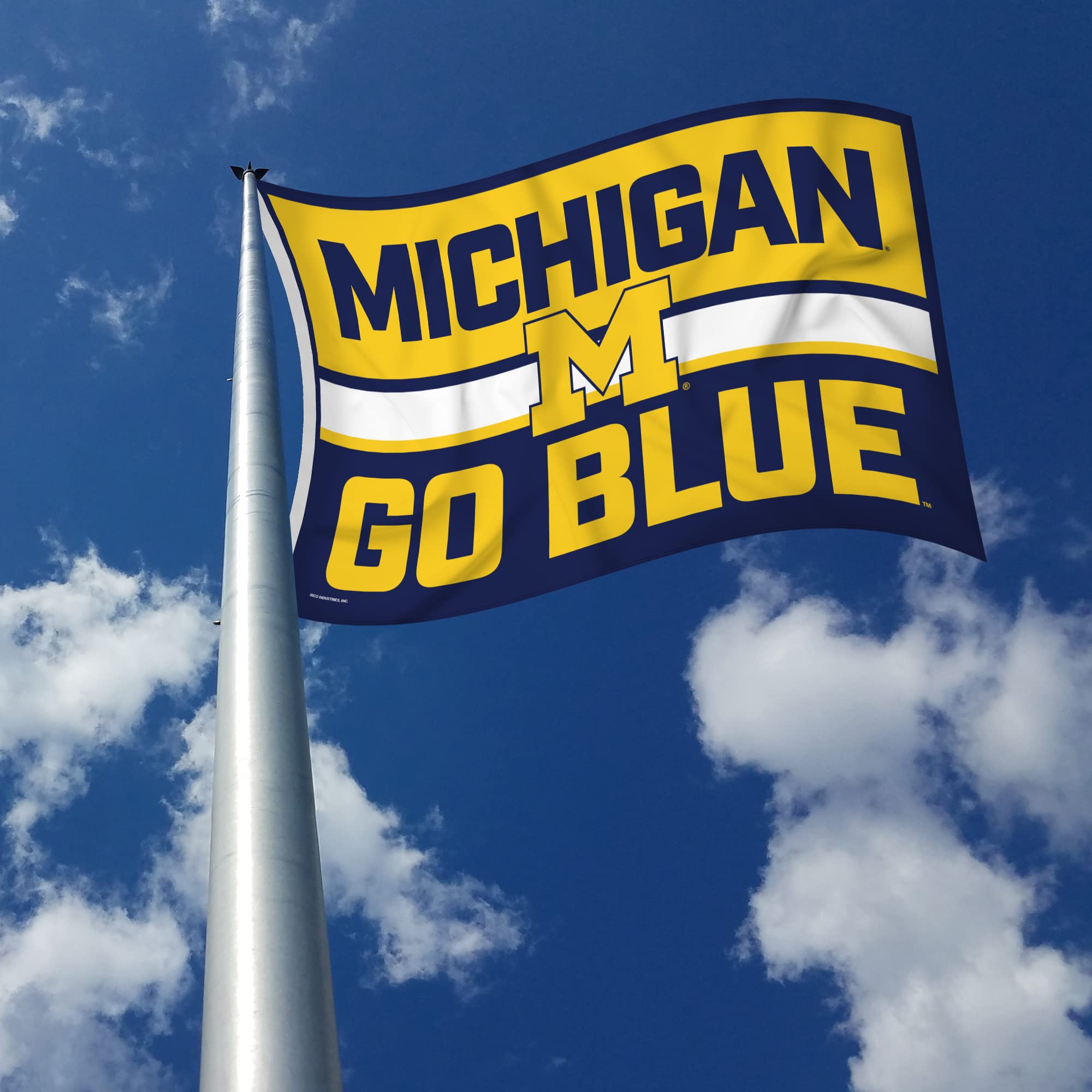 Rico Industries flag hung in a dorm room adding team spirit and vibrant decor to small spaces