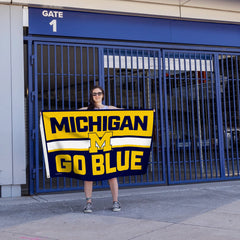 Rico Industries flag flying from a porch flagpole offering visible outdoor support for game day