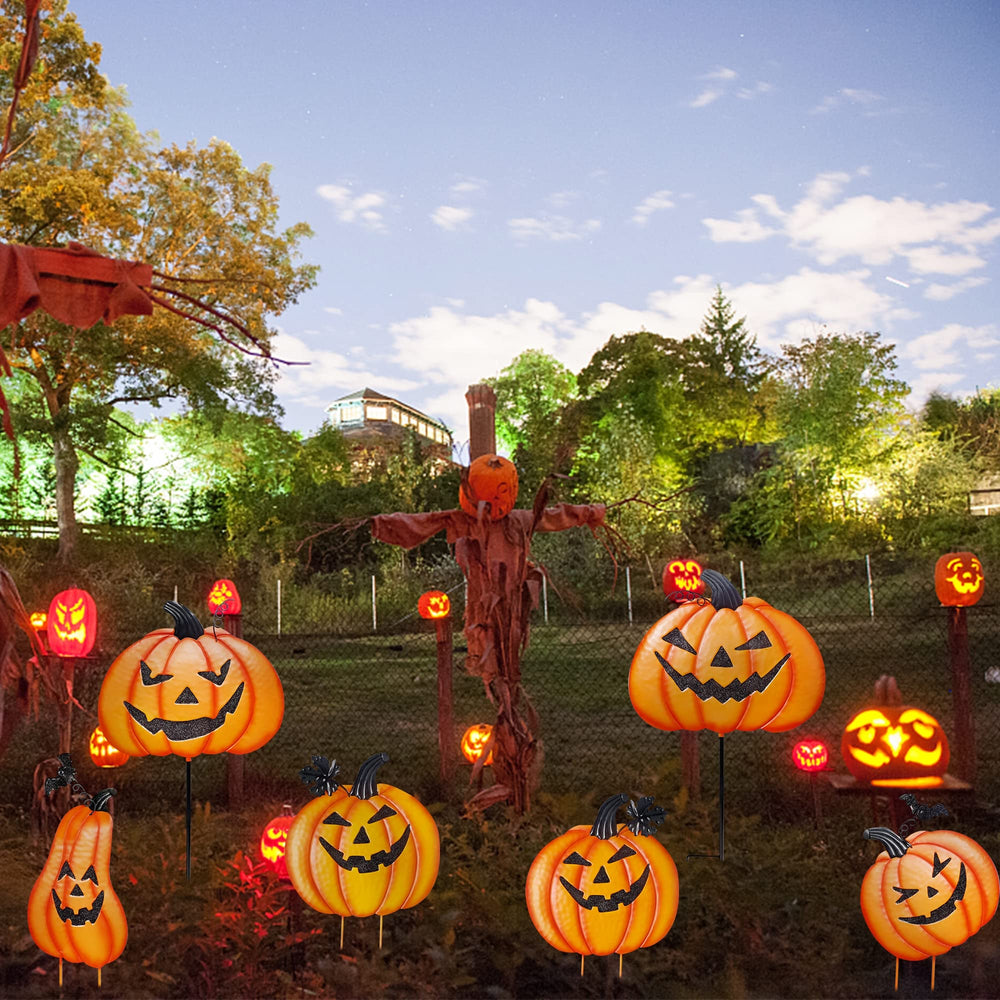 Ridota stacked tall pumpkin display beside walkway, creates a focal seasonal decoration