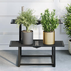 Rioneta front view of black two-tier stand, sturdy display benefit