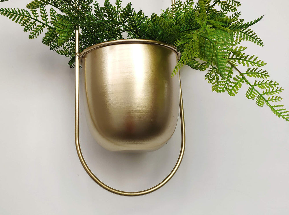 RISEON close-up of gold metal finish and pot texture highlighting durable coating