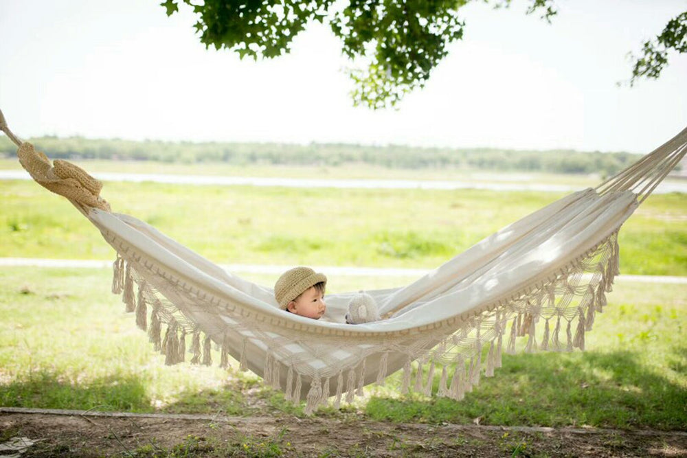 RISEON front view of macramé hammock showing full bed and fringe, adds cozy style