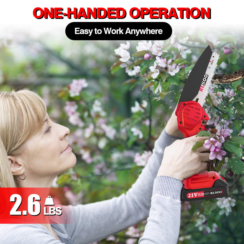 RLSOO handheld chainsaw in a hand for scale showing lightweight portability