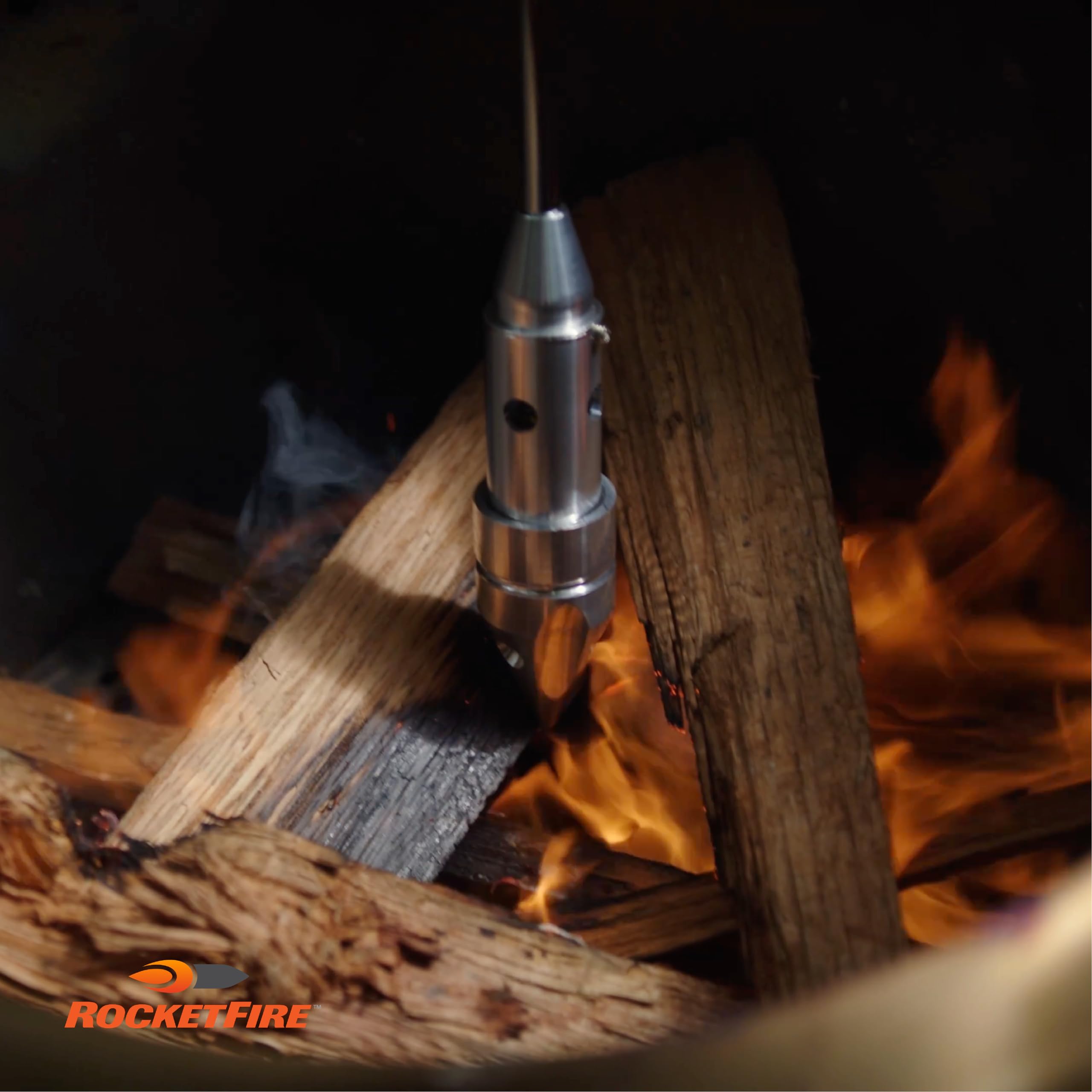 RocketFire next to hand to show scale and easy handheld operation for backyard tasks