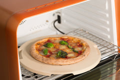 ROCKSHEAT stone on active grill showing high-heat grilling capability benefit