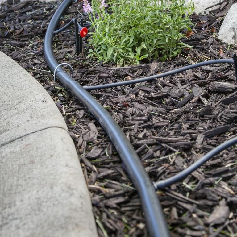 Rocky Mountain Goods tapped with barbed emitter demonstrating easy emitter installation