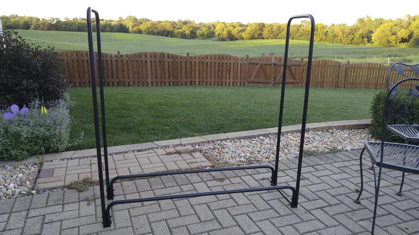 Rocky Mountain Goods on patio with firewood shows attractive, weatherproof outdoor use