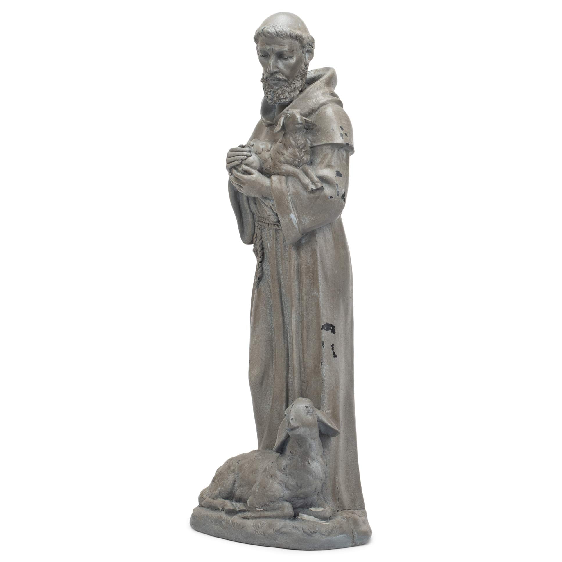 Roman Saint Francis next to a ruler for size comparison and placement planning benefit