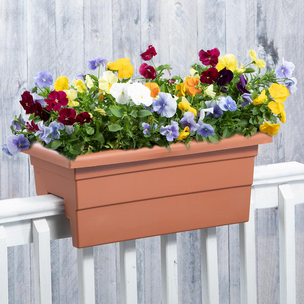 Root & Vessel planter on balcony with flowers showing decorative impact for outdoor living spaces