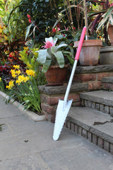 ROOT ASSASSIN shovel cutting roots in soil showing efficient root removal