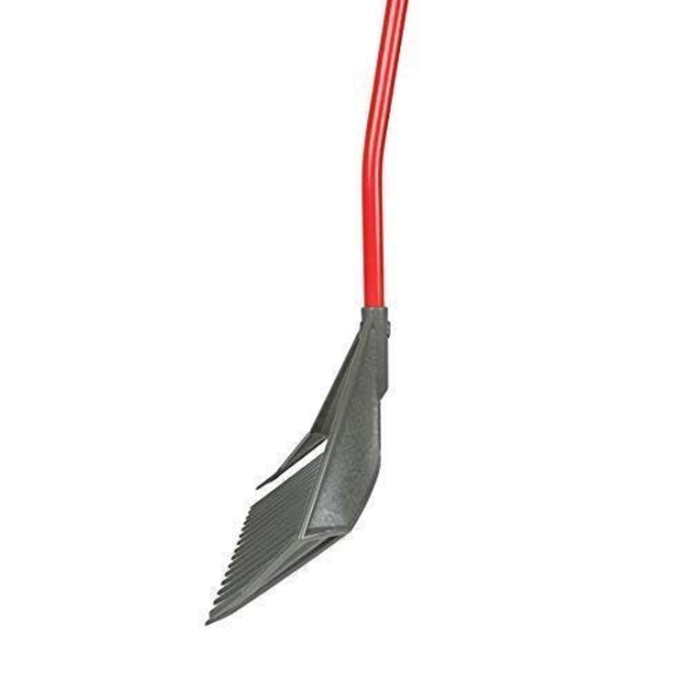 ROOT ASSASSIN in a backyard with homeowner using it for cleanup