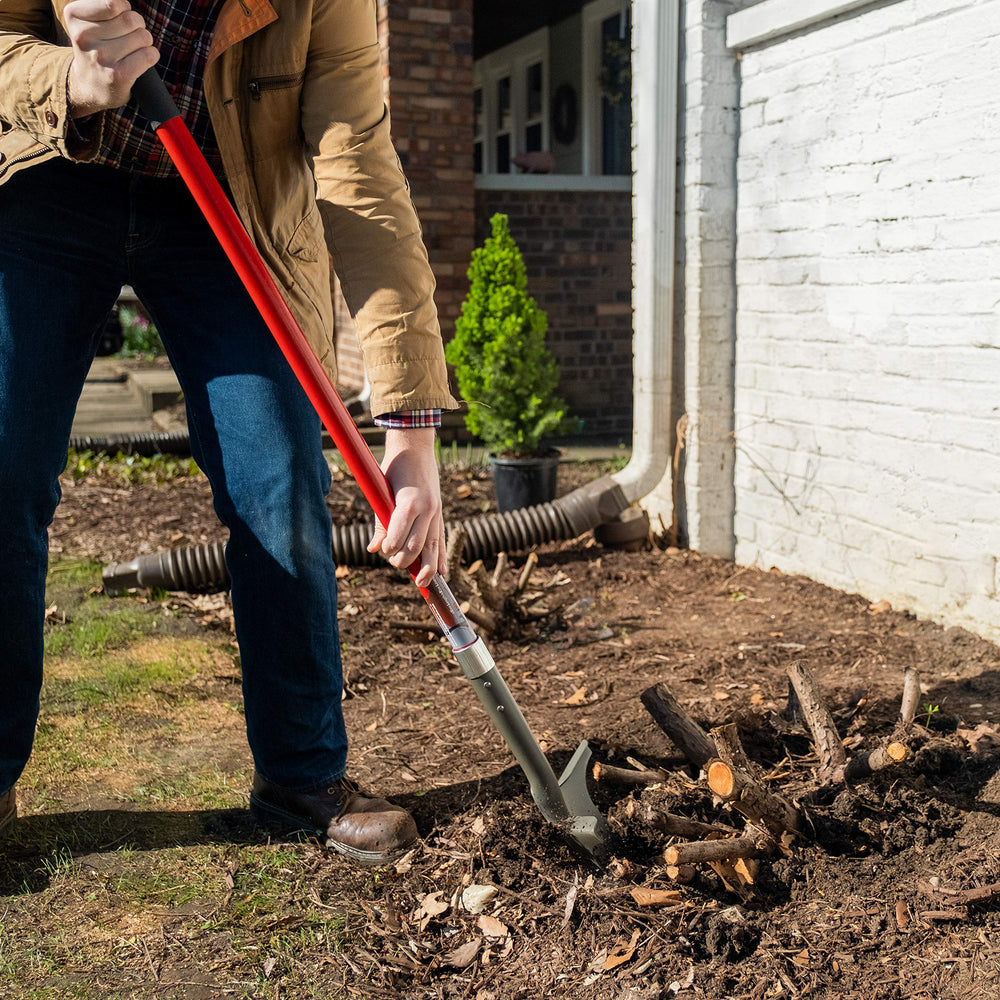 Root Slayer in use digging through roots demonstrating efficient root cutting benefit