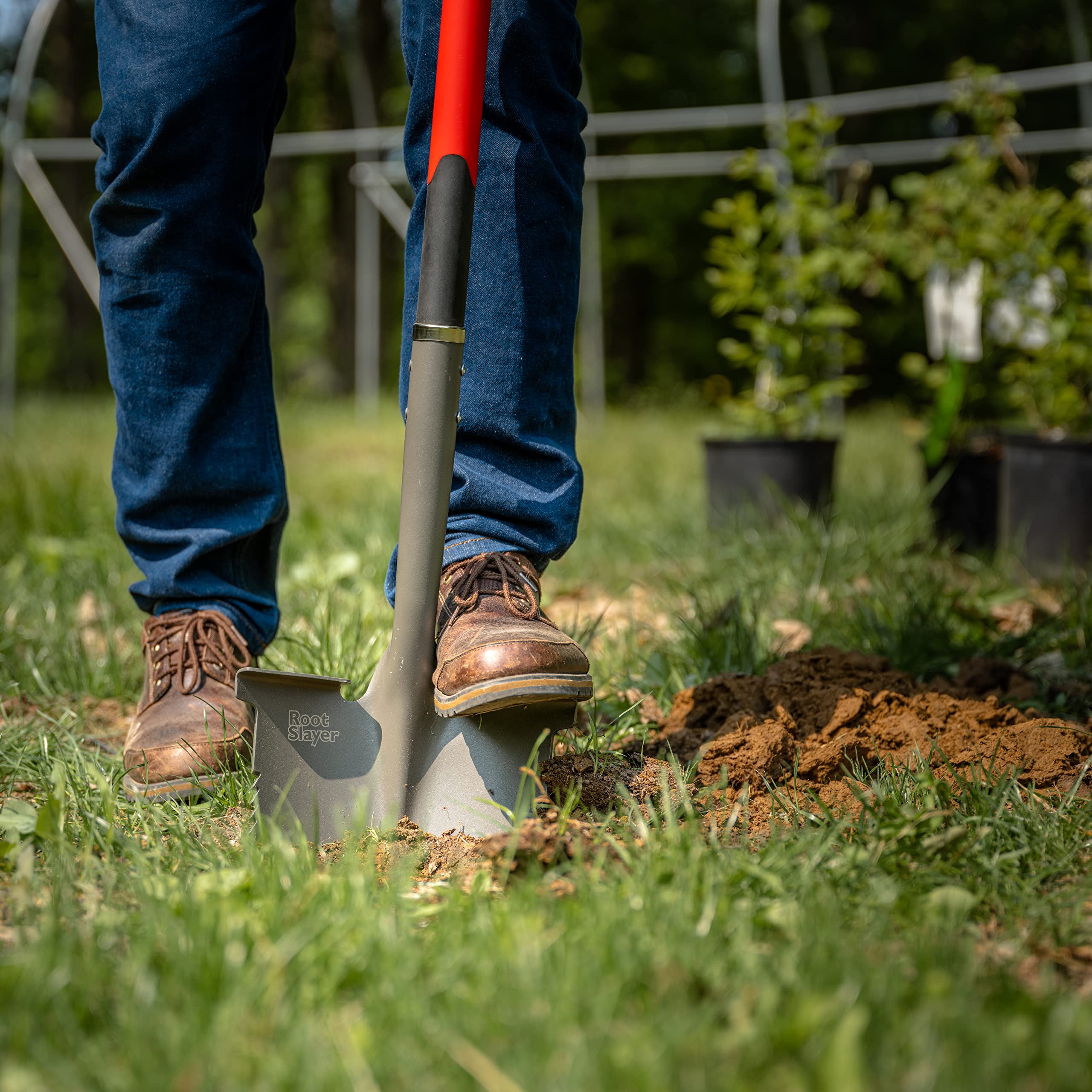 Root Slayer shovel moving soil showing heavy-load handling benefit