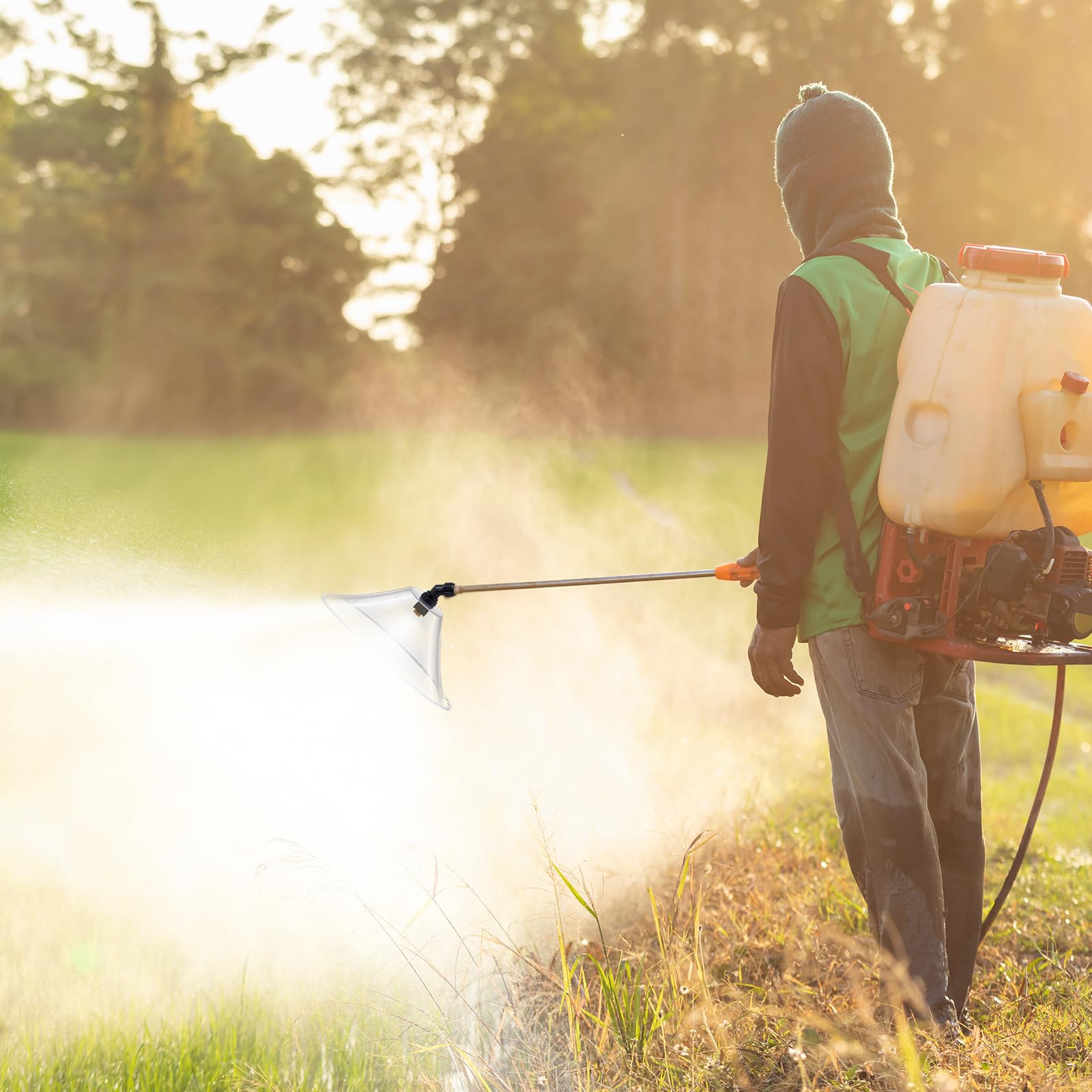 Rossesay lifestyle scene applying spray to garden beds, enhances targeted coverage