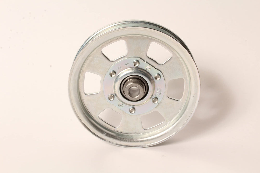Rotary pulley next to coin to show scale and correct sizing benefit
