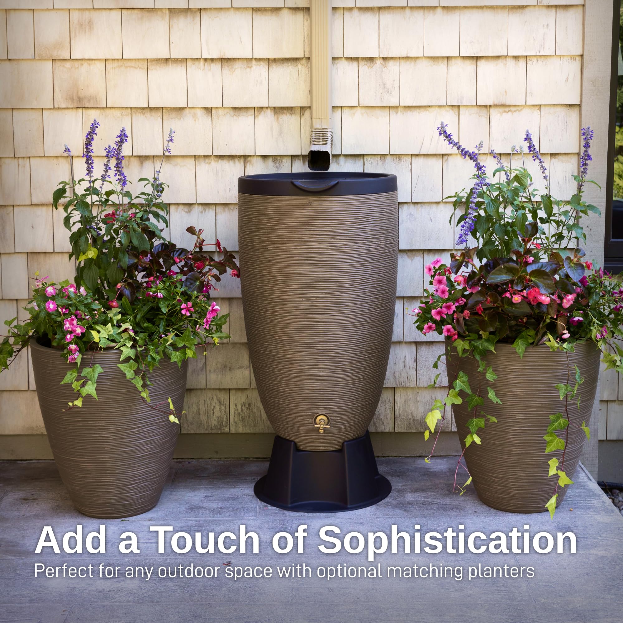 RTS Home Accents barrel on stand next to person with watering can, demonstrates accessible height
