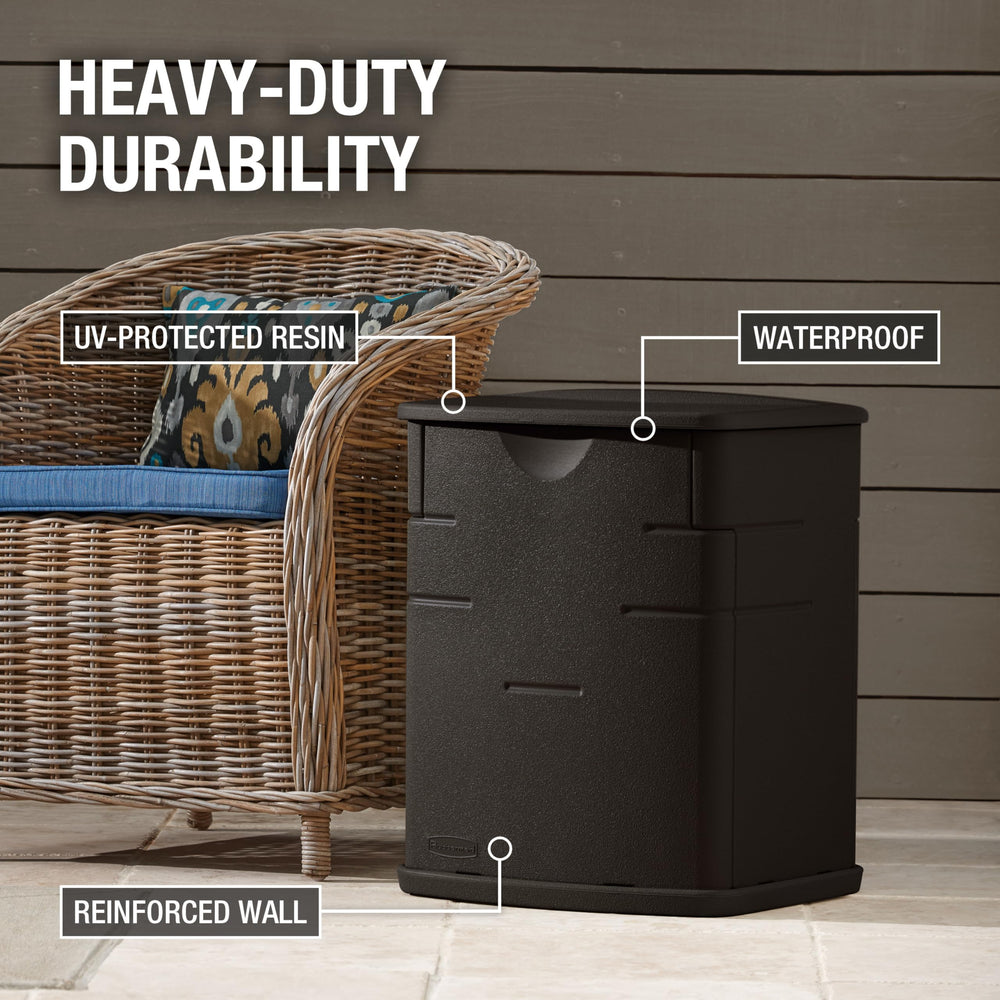 Rubbermaid deck box open interior with organized garden tools demonstrating capacity