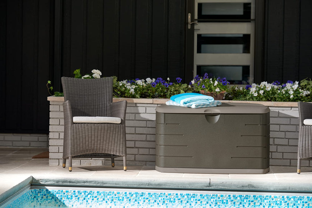Rubbermaid deck box in a patio setting offering tidy storage and extra seating