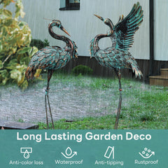 Ruifabo cranes installed by a pond creating tranquil focal point and landscape charm