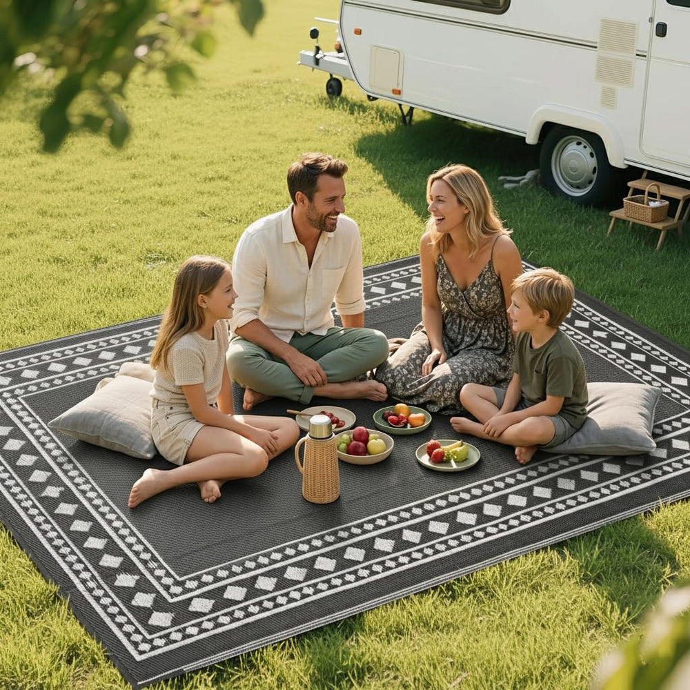 RURALITY rug beside loveseat to show 8x10 scale and area-defining benefit