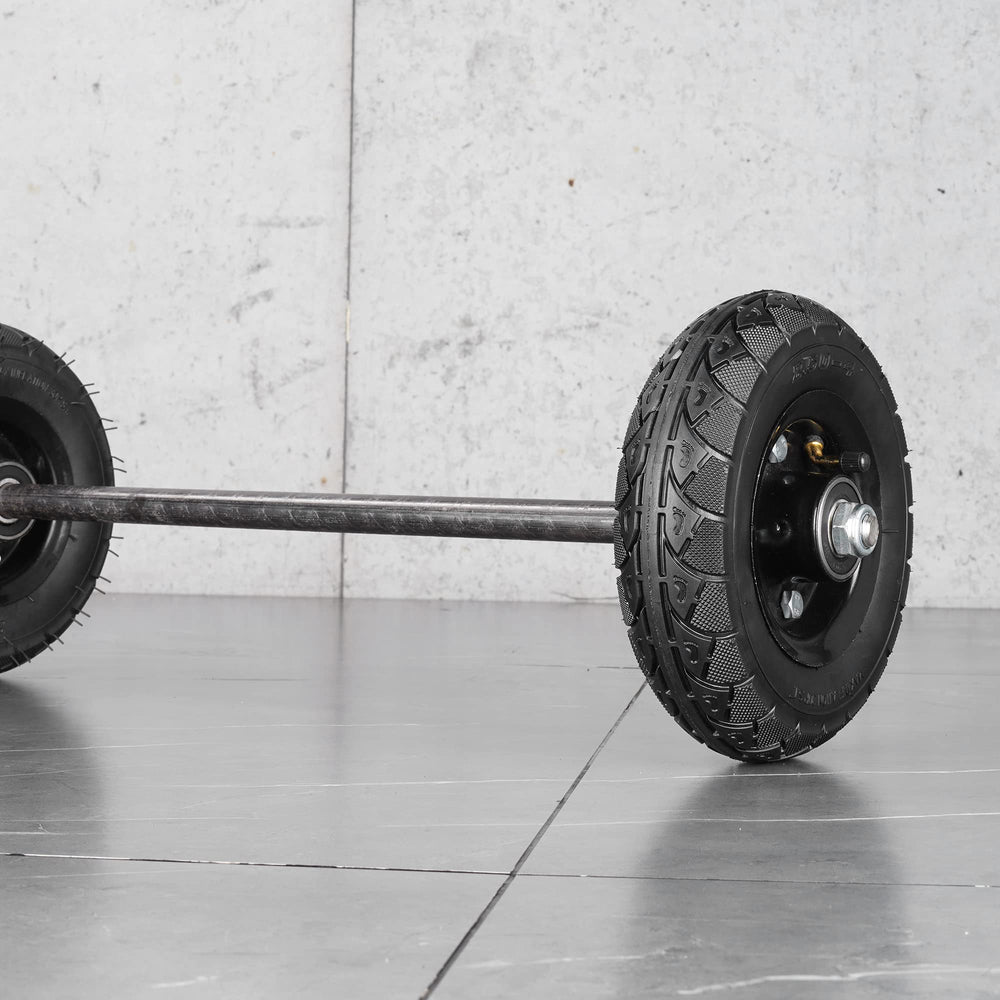 RUTU tire next to hand truck for scale and correct 2.50-4 fitment