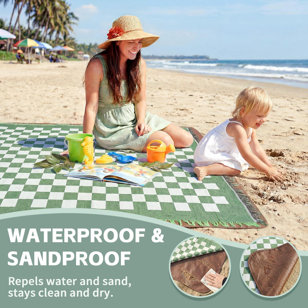 RYCHIC blanket laid on sand illustrating moisture protection and roomy seating