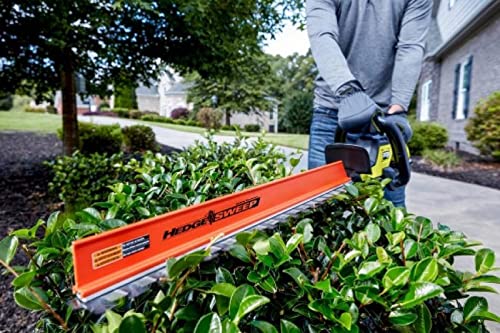 RYOBI close-up of 26-inch dual-action blade highlighting clean, high-capacity cutting