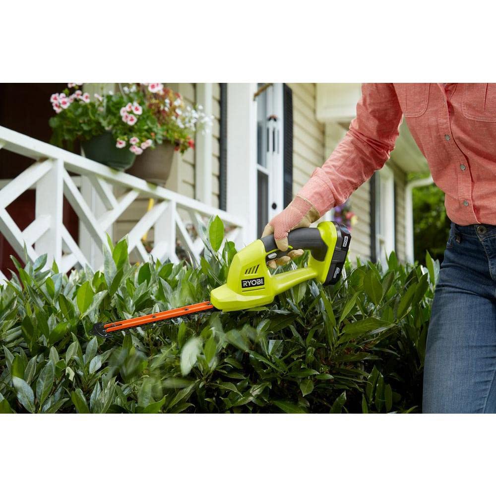 RYOBI P2900B held beside ruler to show compact size and portability